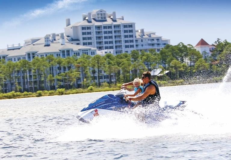 man and son on a sea-doo