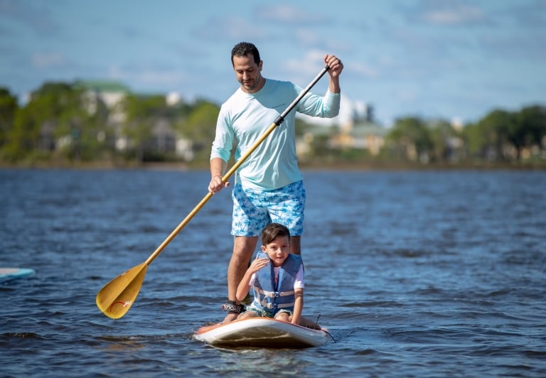 Father and son paddlebaording