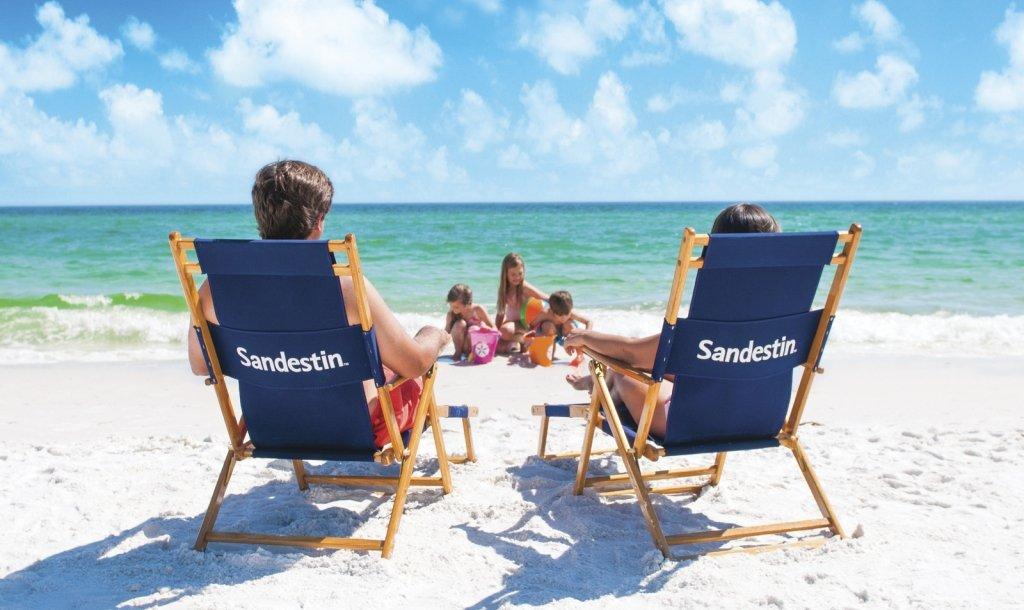 Two people enjoying the beach at Sandestin 