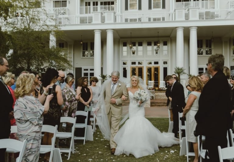 Father walking bride down the isle