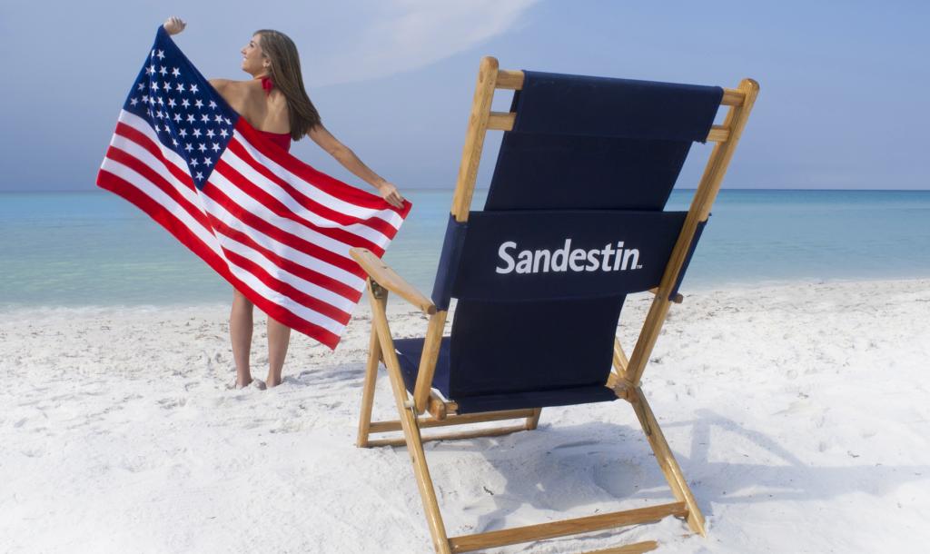 Sandestin beach chair with American flags.