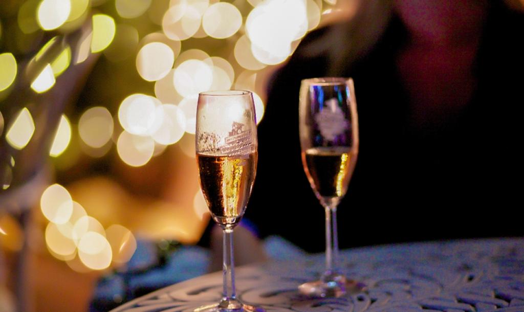 Sparkling Wine and Holiday Lights